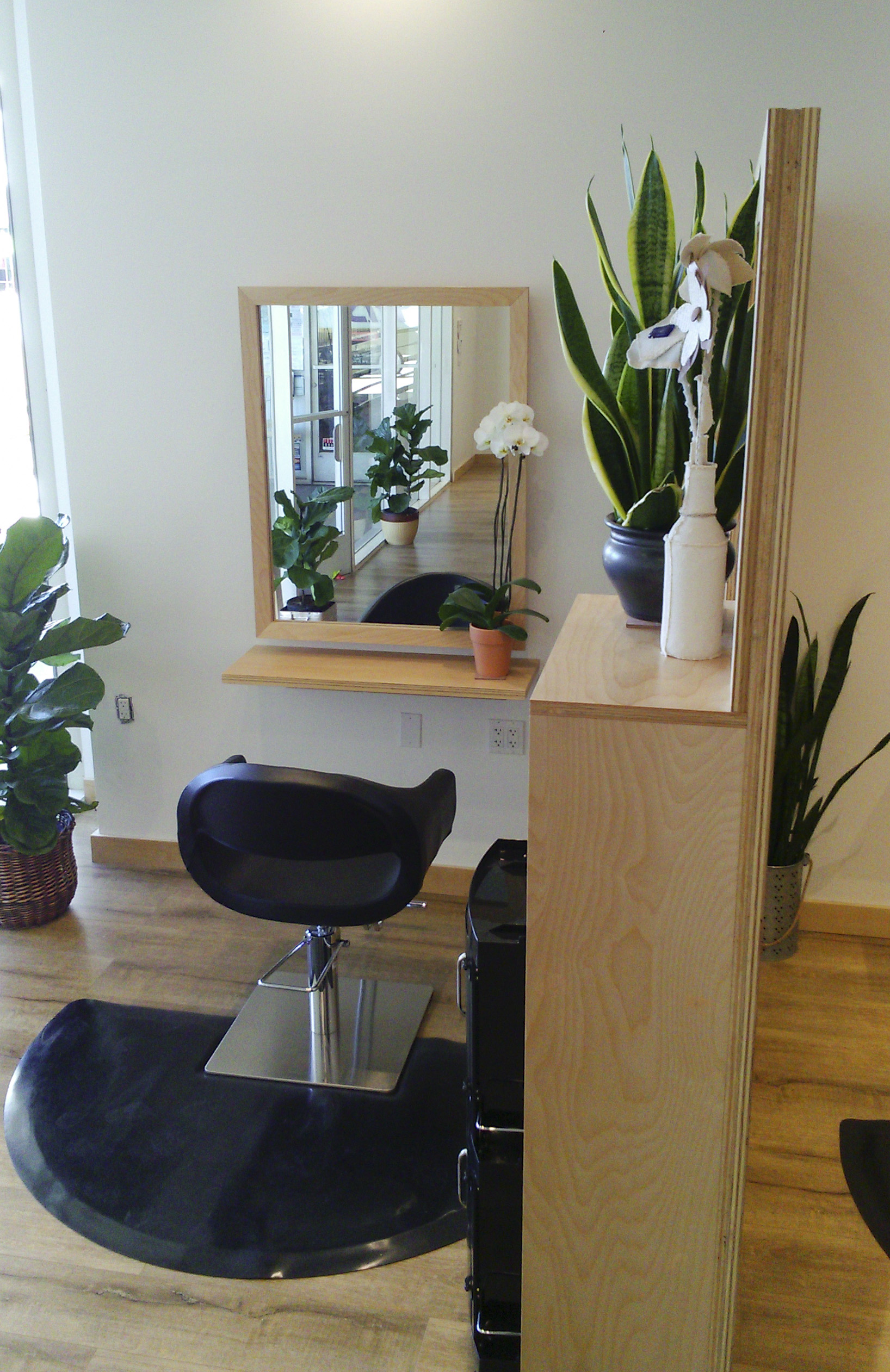Light-filled interior of Loops Hair Studio